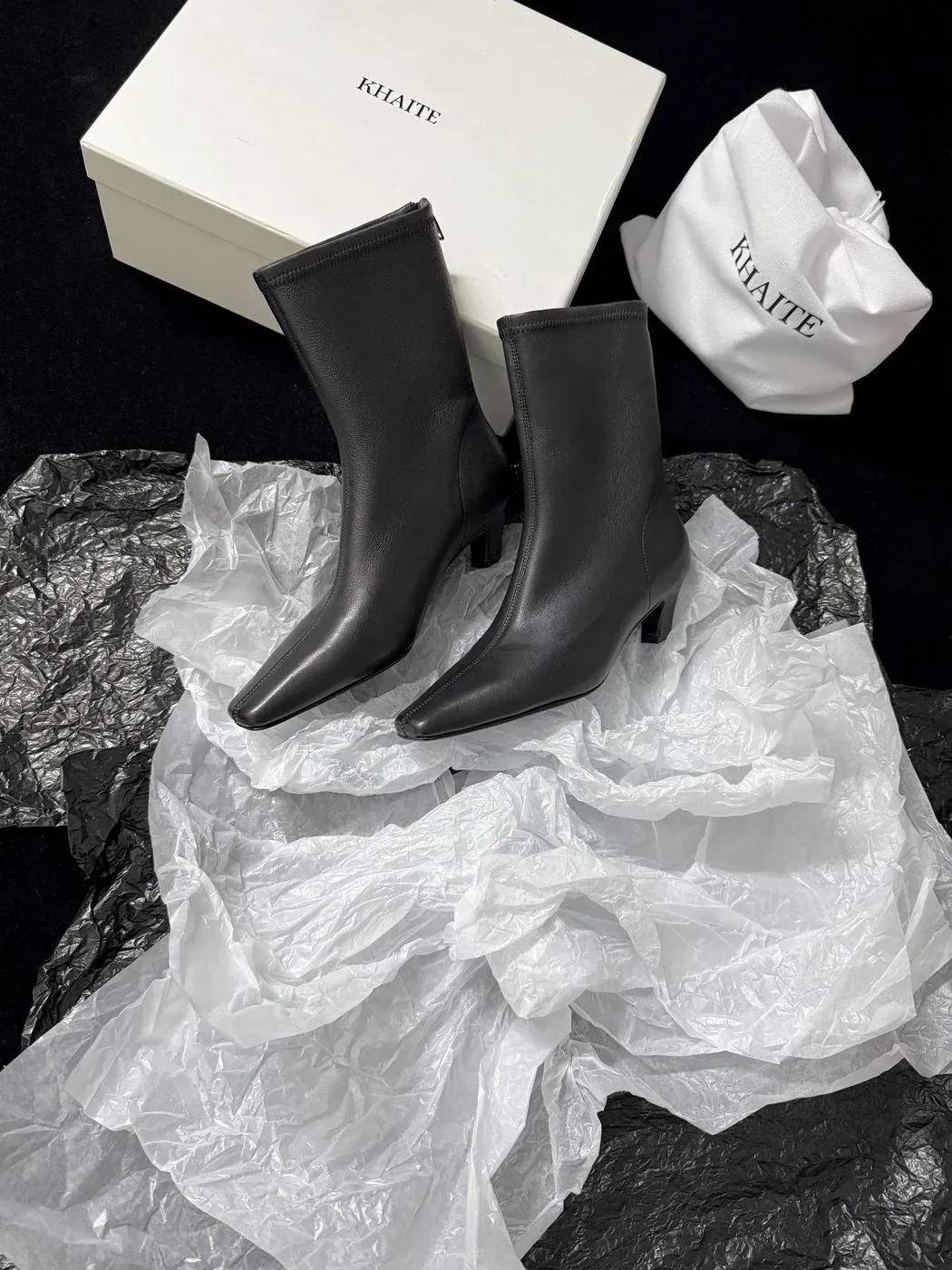 Khaite Alternative Pointed Elastic Ankle Boots in Black
