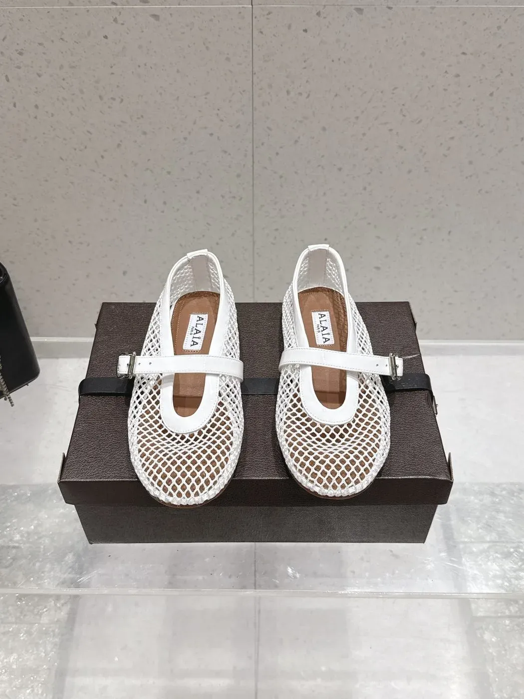 Alaïa Alternative Thong Ballet Sandal in White