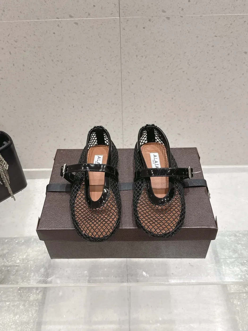 Alaïa Alternative Thong Ballet Sandal in Black