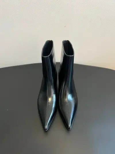 Khaite Alternative Zip Ankle Boots in